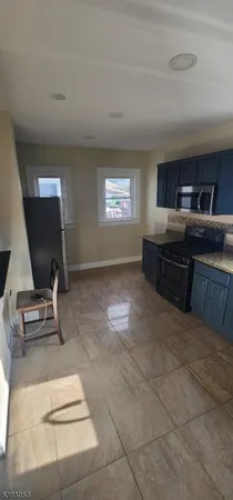 a room with furniture and a flat screen tv