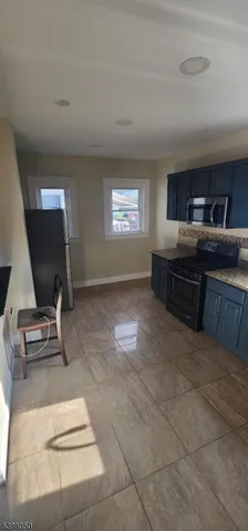 a room with furniture and a flat screen tv