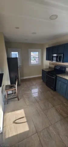 a room with furniture and a flat screen tv