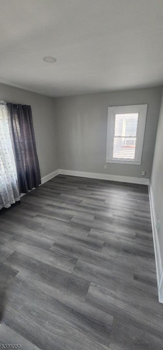 530 Drake Avenue Roselle, NJ 07203 - Photo 9 of 19 a view of an empty room and wooden floor