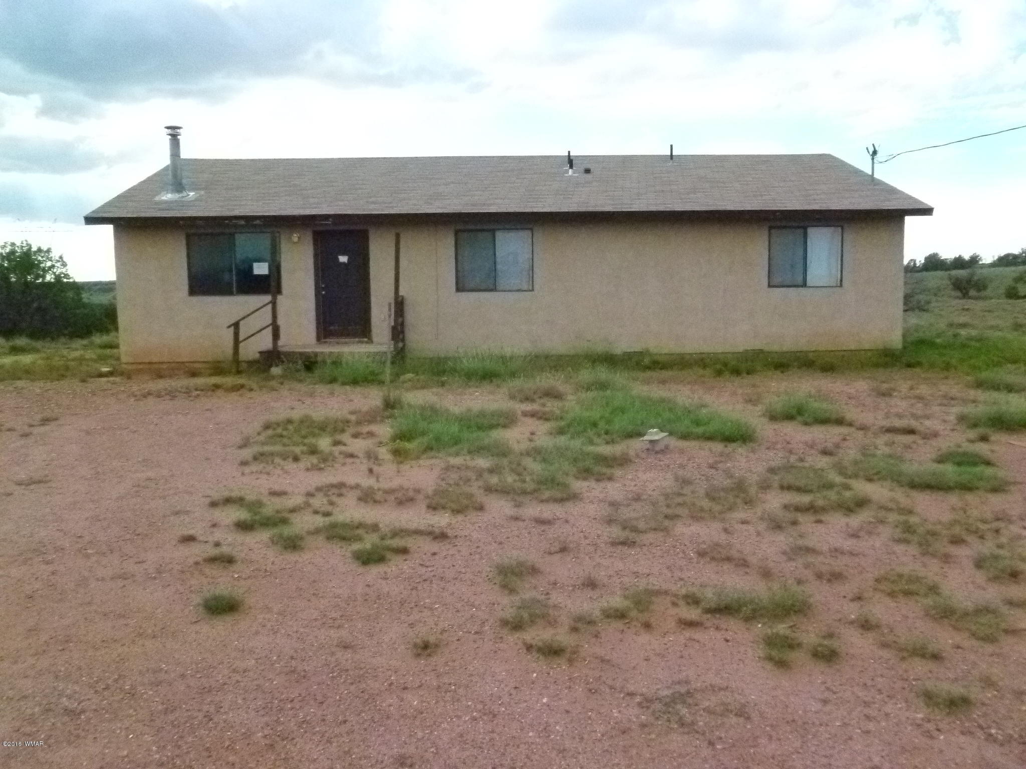 5218 Longhorn Road Snowflake, AZ 85937 - Photo 1 of 41 a front view of a house with garden