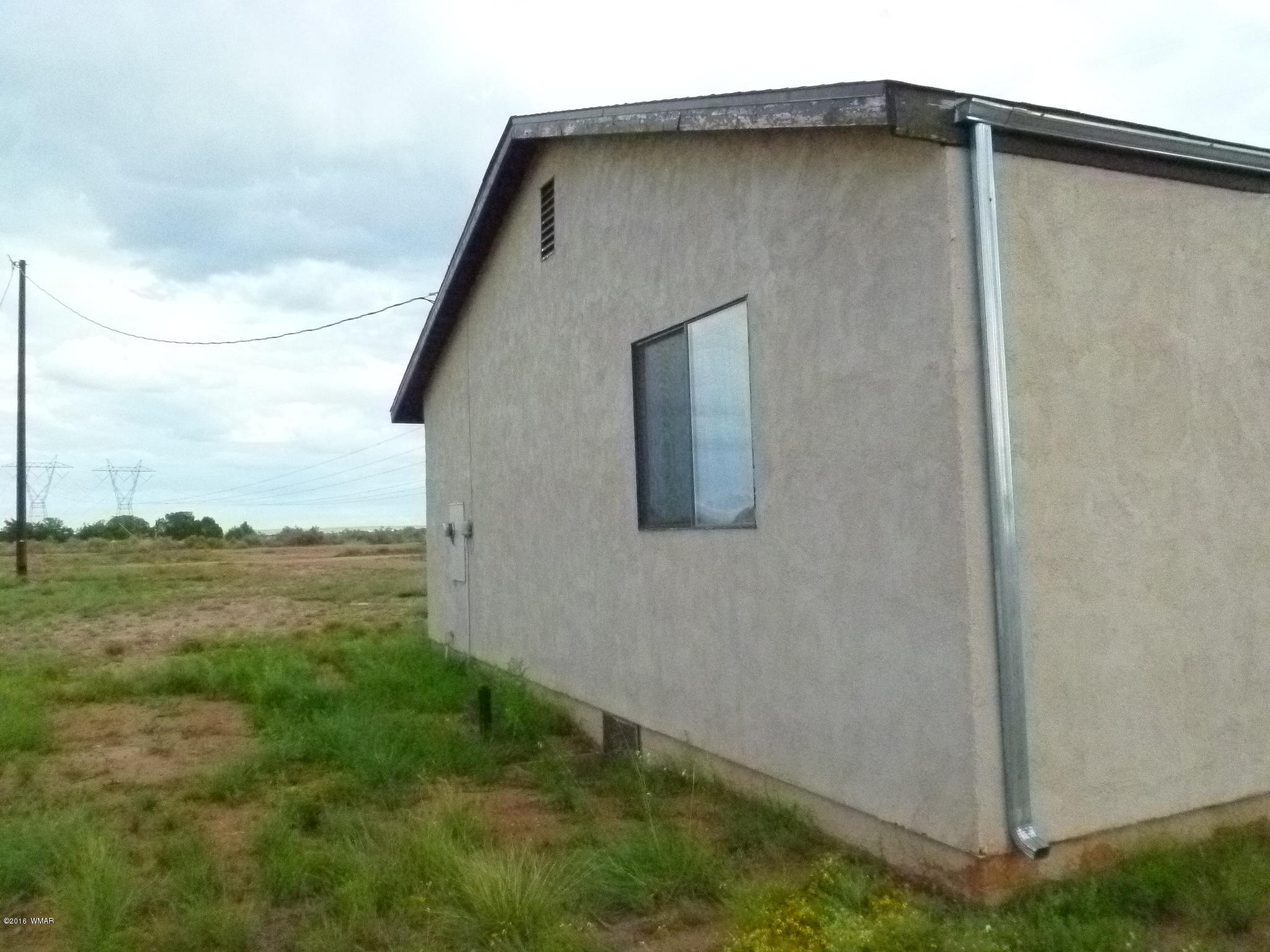 5218 Longhorn Road Snowflake, AZ 85937 - Photo 22 of 41 a backyard of a house with lots of green space
