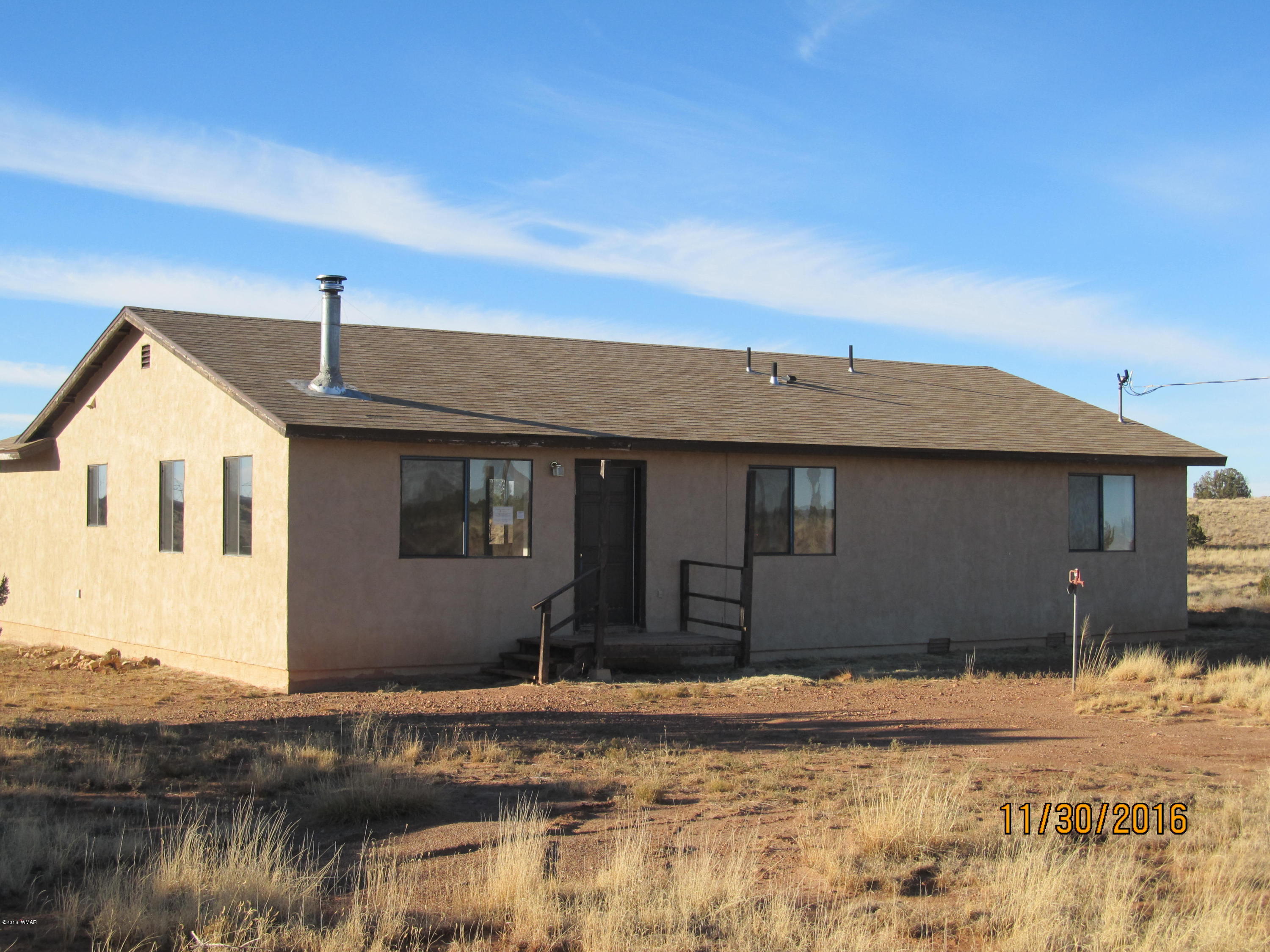 5218 Longhorn Road Snowflake, AZ 85937 - Photo 38 of 41 a front view of a house with a yard
