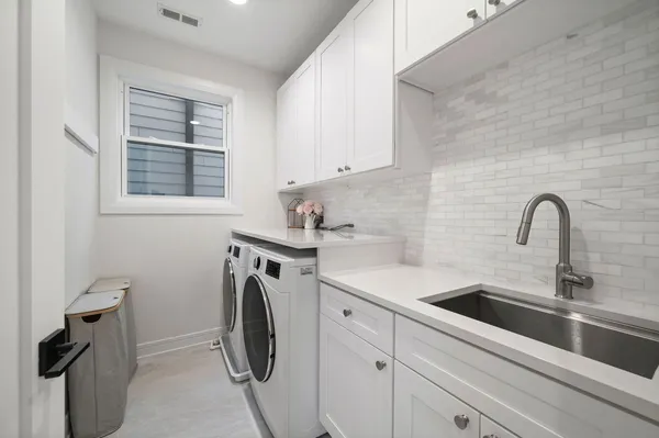 a view of kitchen and sink