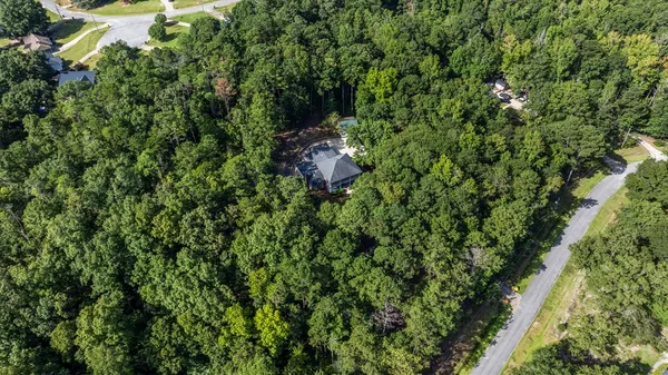 a view of a house with a tree