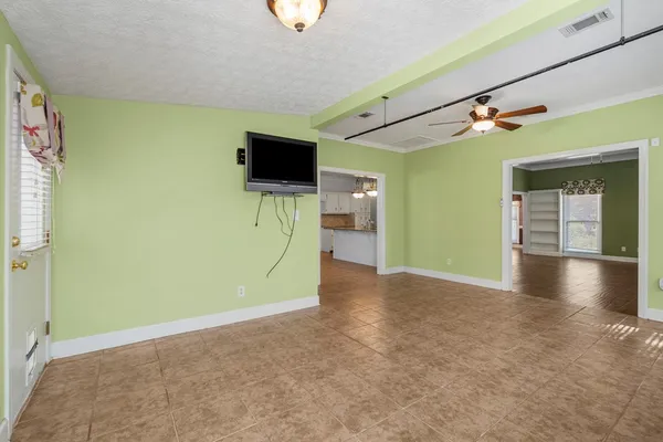 a view of a livingroom with a flat screen tv