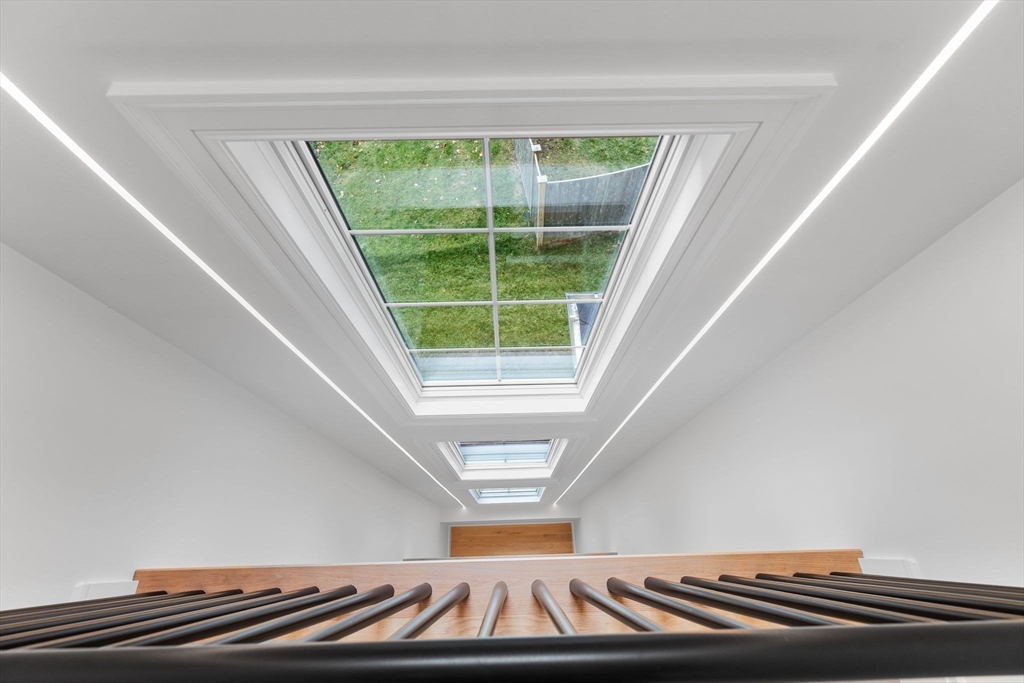 247 Broad Meadow Road Needham, MA 02492 - Photo 26 of 40 a view of staircase with large window