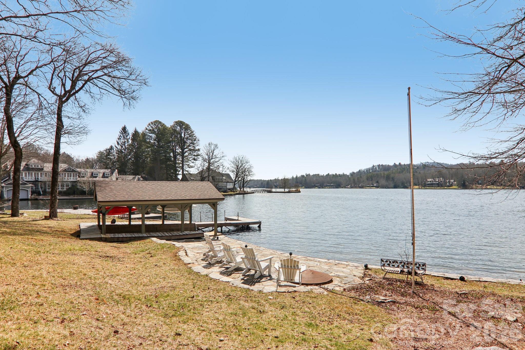 987 Cold Mountain Road Lake Toxaway, NC 28747 - Photo 2 of 42 a car parked on the side of the river