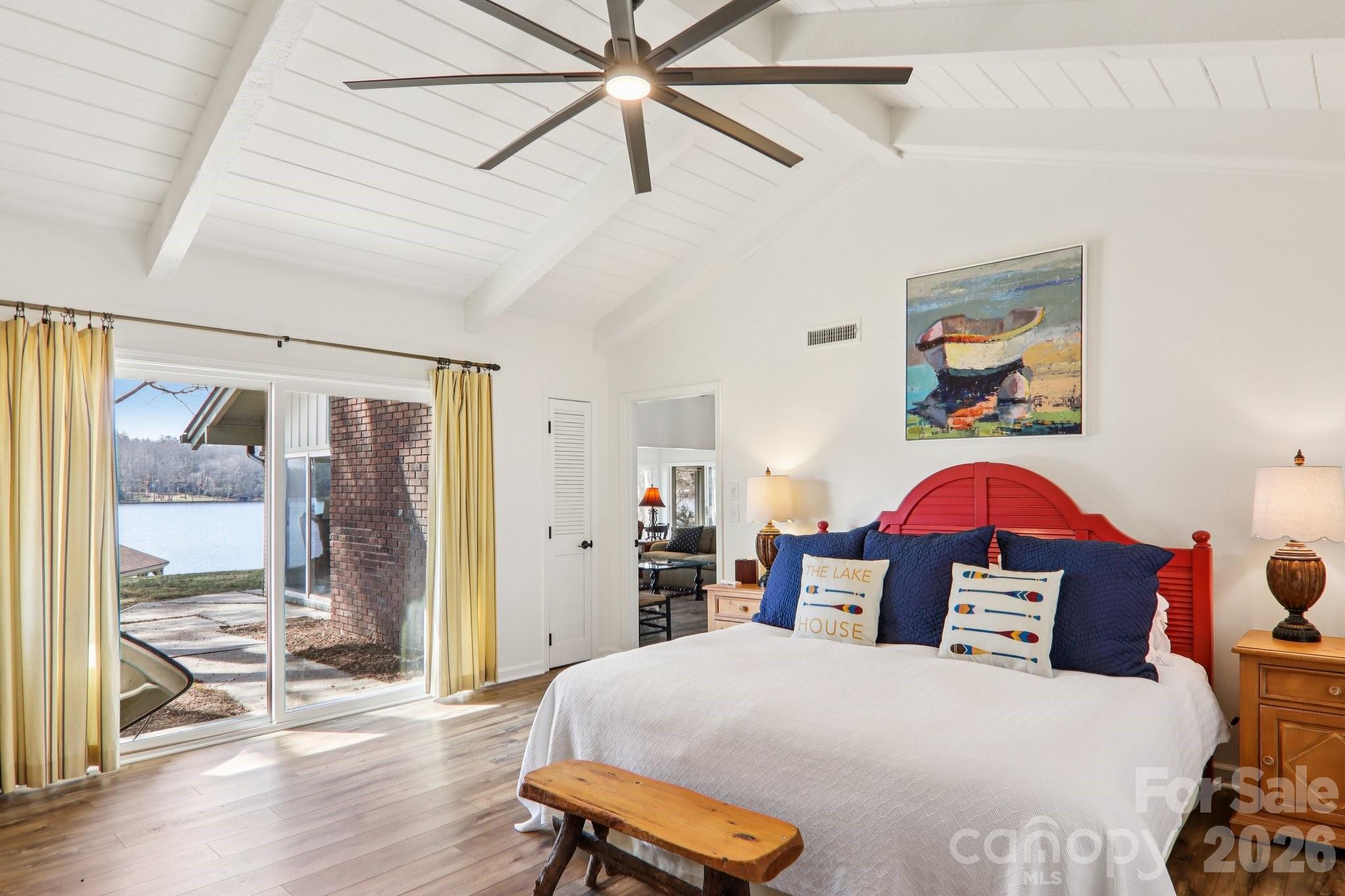 987 Cold Mountain Road Lake Toxaway, NC 28747 - Photo 26 of 42 a bedroom with a bed and wooden floor