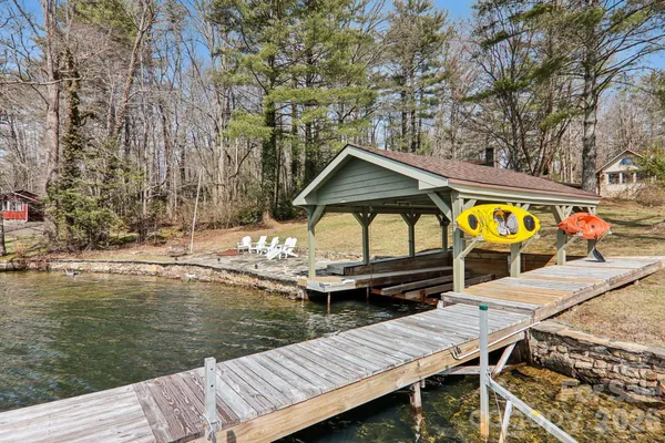a view of swimming pool with outdoor seating