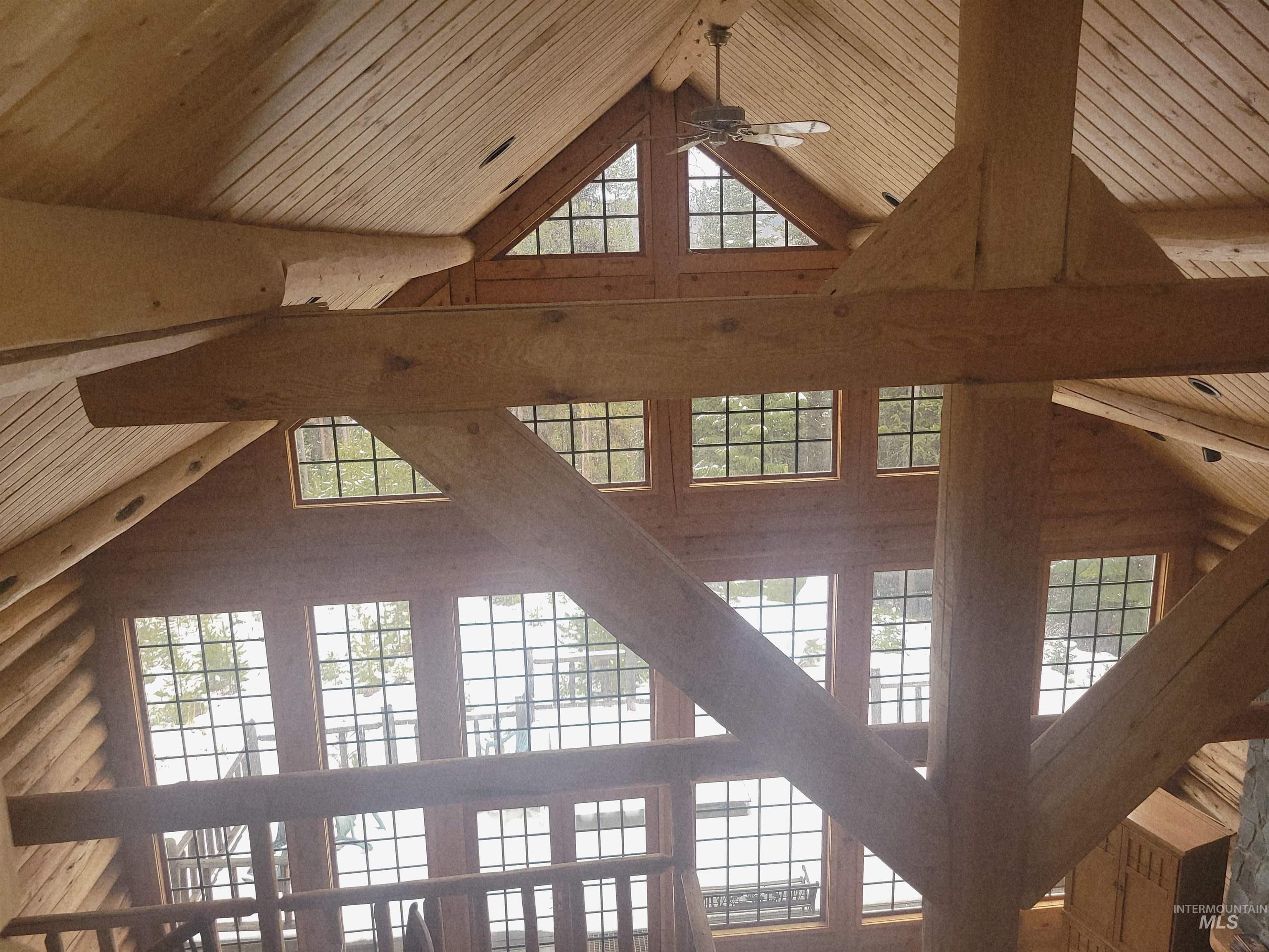 129 Copperhead Road Elk City, ID 83525 - Photo 16 of 28 Detailed view of a wooden ceiling with exposed beams