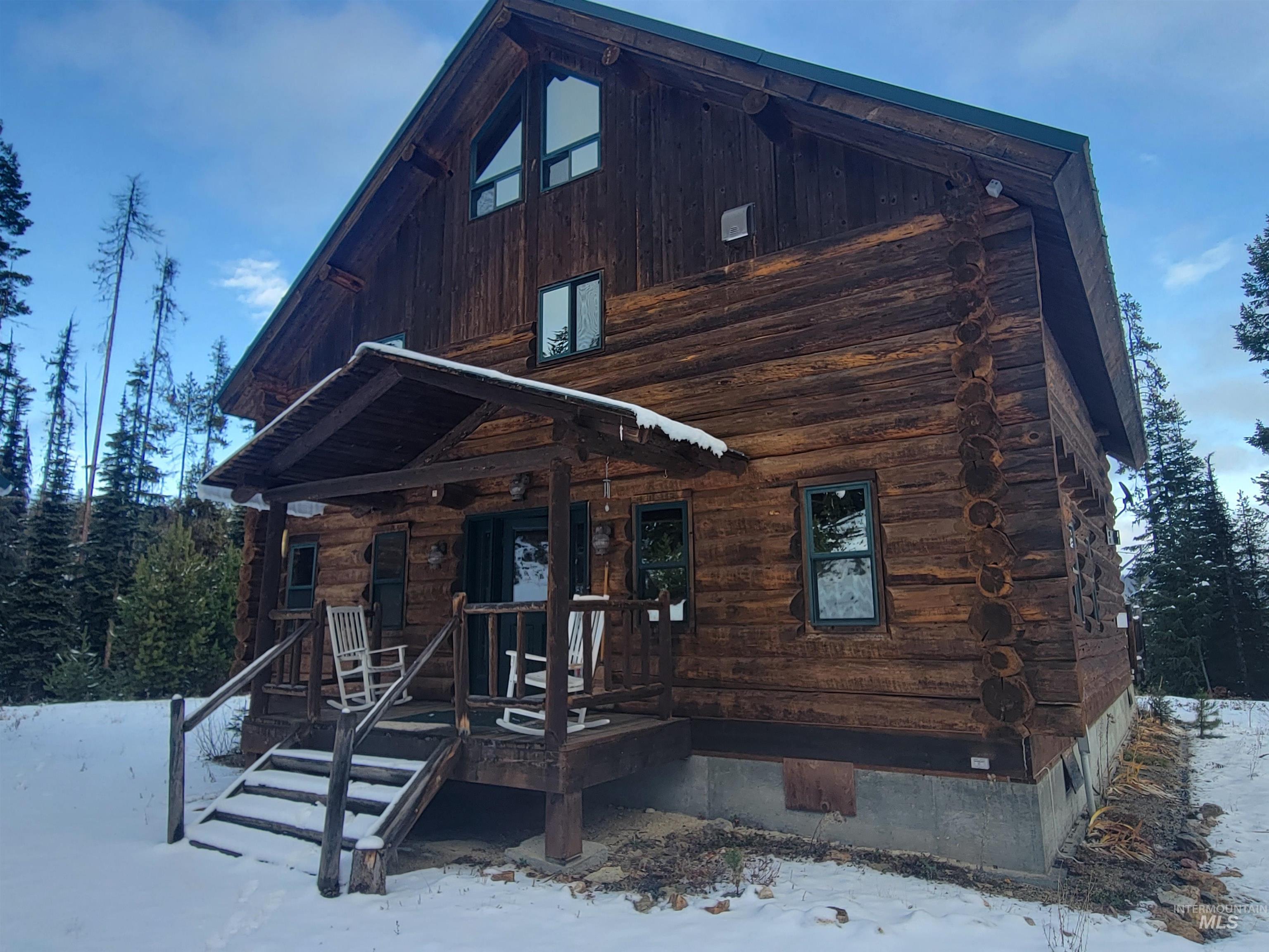 129 Copperhead Road Elk City, ID 83525 - Photo 19 of 28 View of front of home with a porch and log exterior
