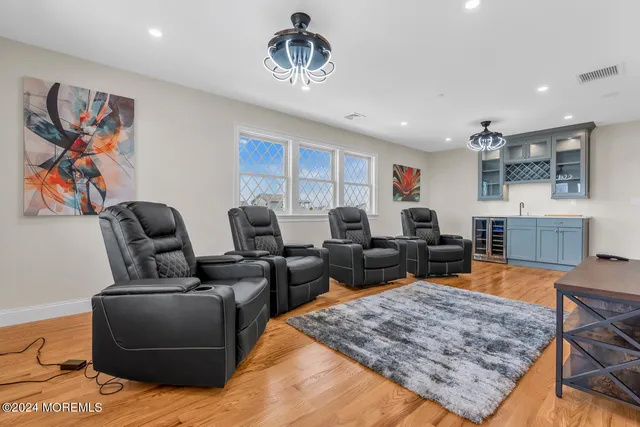 an aerial view of residential houses with city view