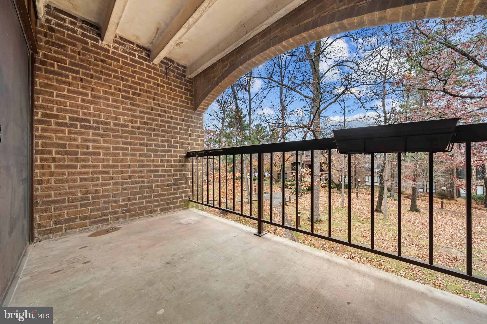 11200 Chestnut Grove Square, Unit 203 Reston, VA 20190 - Photo 33 of 41 a view of a balcony