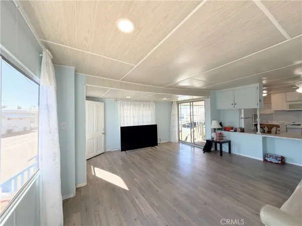 a view of livingroom with furniture and wooden floor