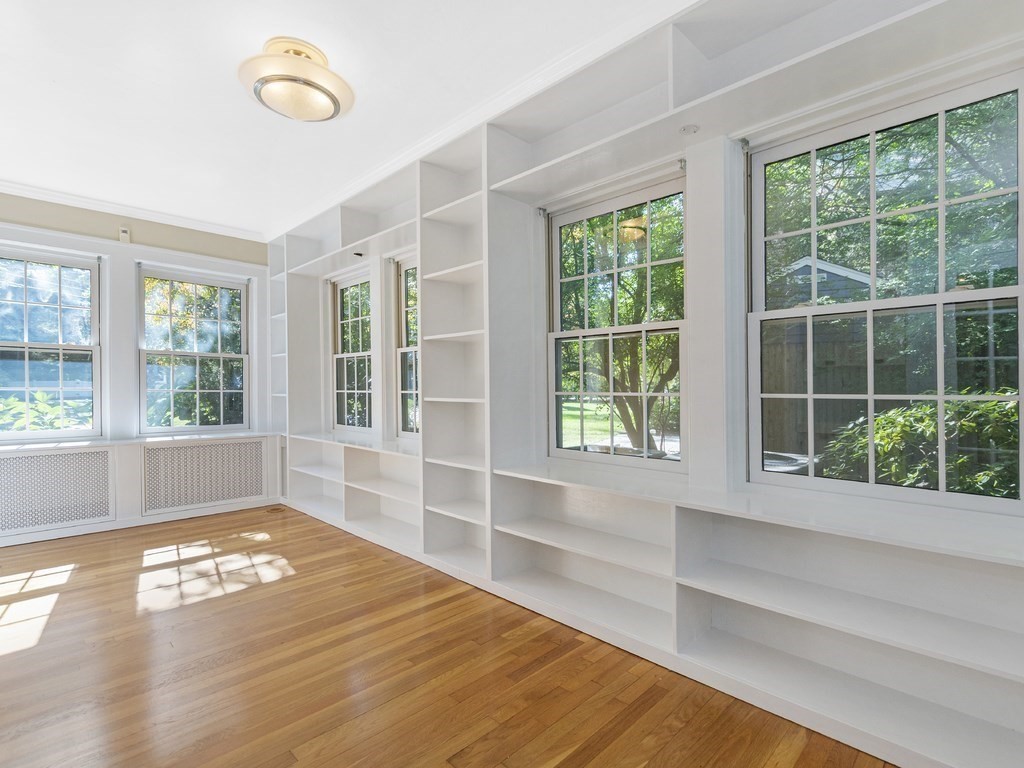 9 Larch Road Newton, MA 02468 - Photo 15 of 34 a view of empty room with wooden floor and fan