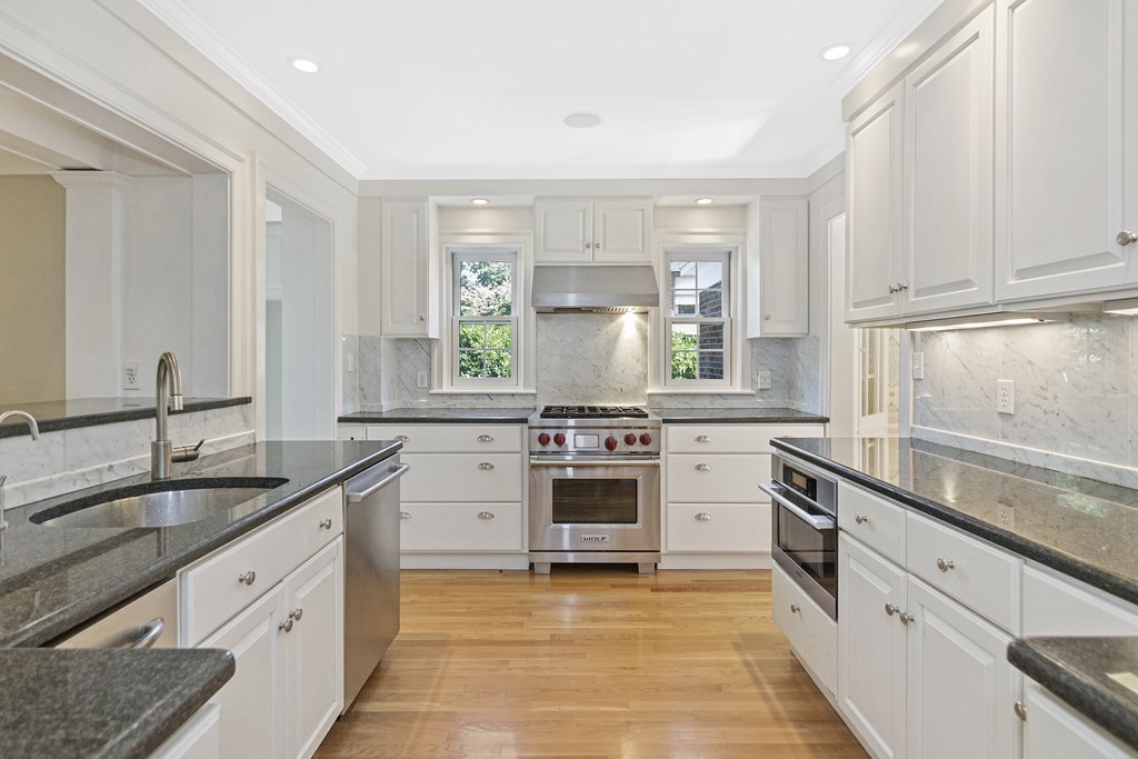 9 Larch Road Newton, MA 02468 - Photo 8 of 34 a kitchen with a stove oven and sink