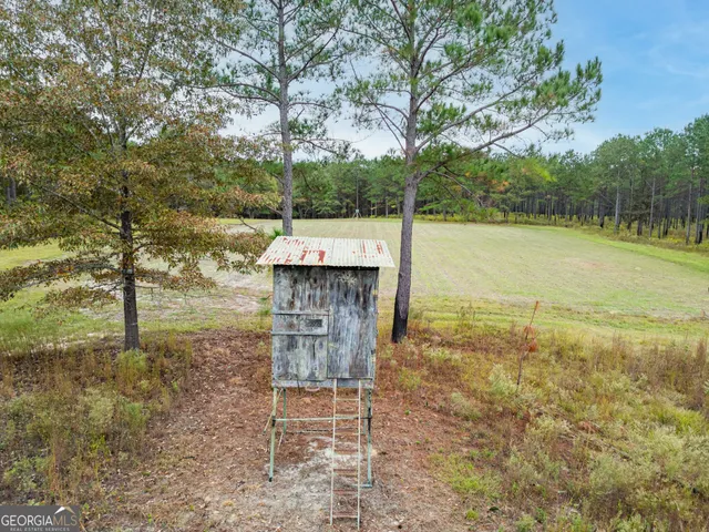 a view of lake with green space