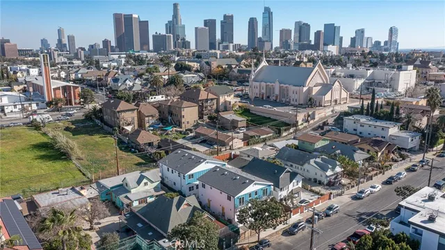 an aerial view of a city with lots of residential buildings