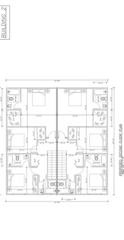 a view of a large building with a big yard