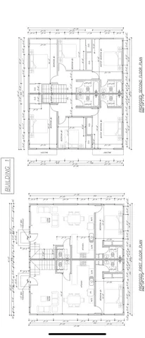 an aerial view of multiple houses with outdoor space