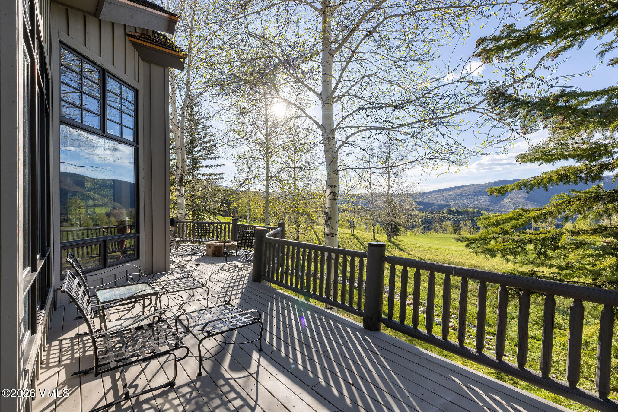 102 Saddle Ridge Loop Edwards, CO 81632 - Photo 17 of 29 a view of balcony with wooden floor and outdoor seating