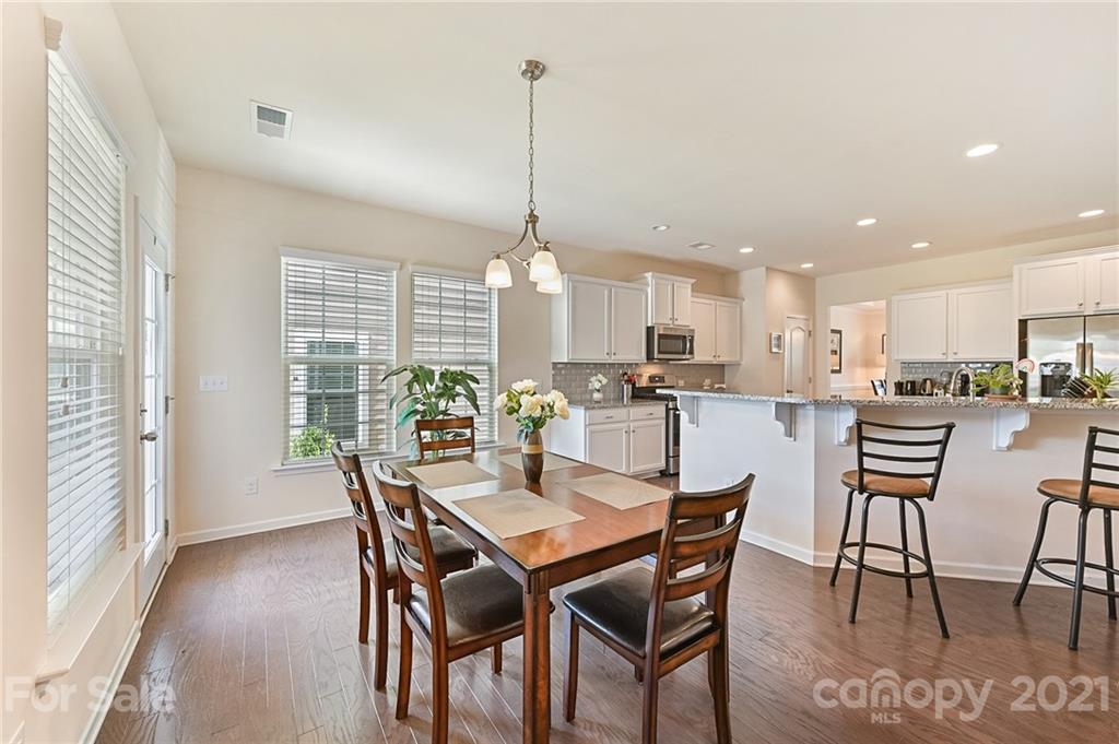 4032 Whittier Lane Fort Mill, SC 29708 - Photo 14 of 34 a dining room with furniture and window