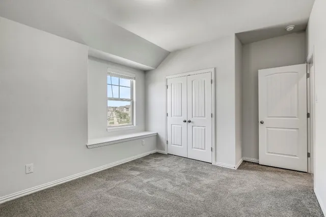 a view of an empty room with window