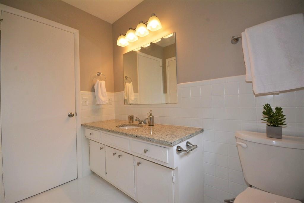 3017 Anderson Road Nashville, TN 37217 - Photo 20 of 29 a bathroom with a toilet sink and mirror
