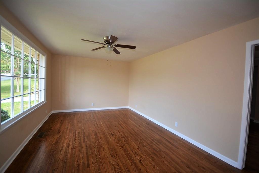 3017 Anderson Road Nashville, TN 37217 - Photo 3 of 29 a view of empty room with wooden floor and fan
