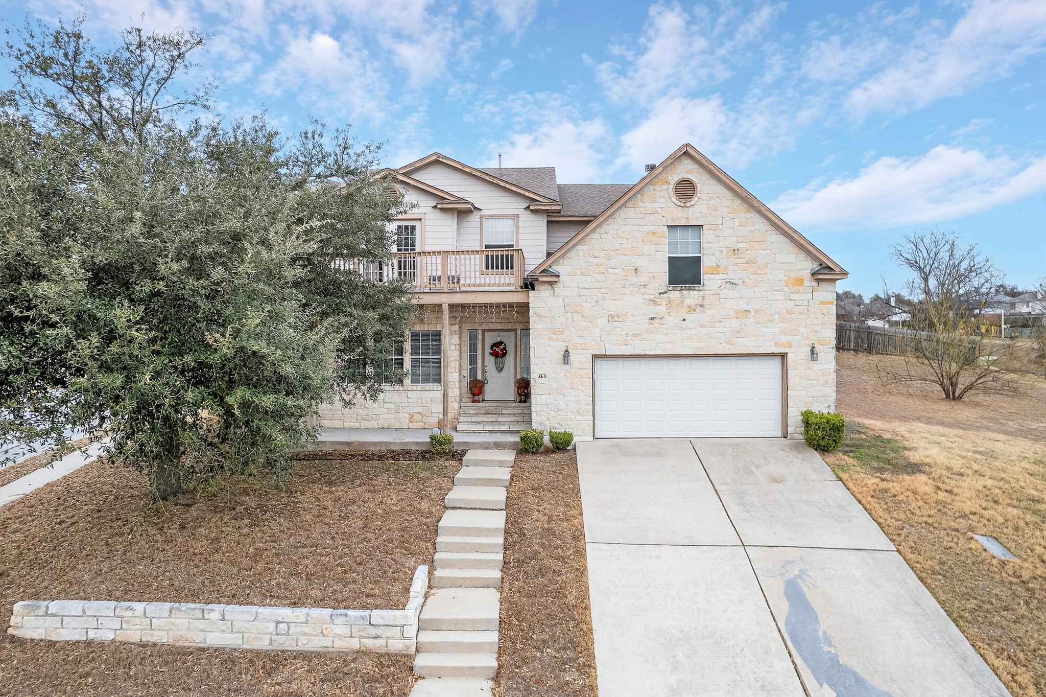 3811 Hawk View Street Round Rock, TX 78665 - Photo 2 of 20 a view of white house with a yard