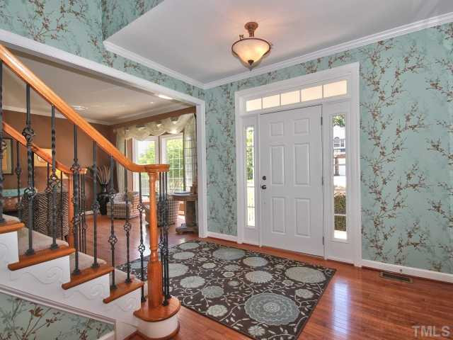 1817 Wescott Drive Raleigh, NC 27614 - Photo 2 of 25 Greet guests in the bright and open foyer with hardwood floors. Foyer