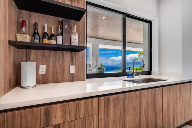 a kitchen with a large window