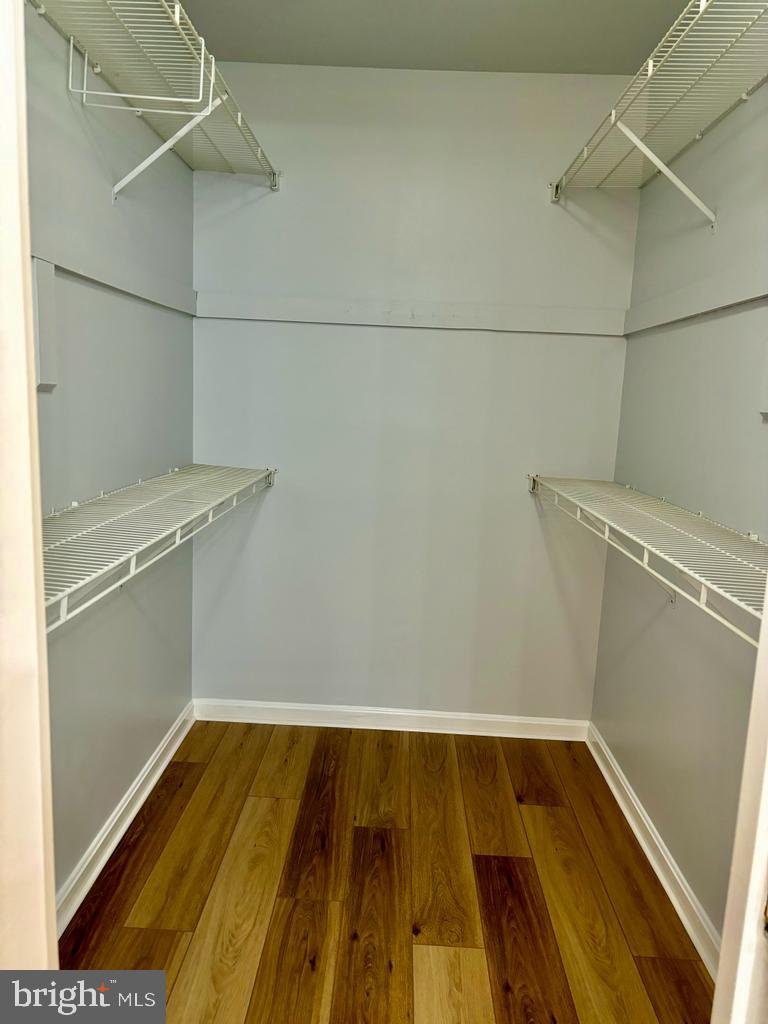 6803 Wild Rose Court Springfield, VA 22152 - Photo 24 of 49 a view of a room with racks on the wall