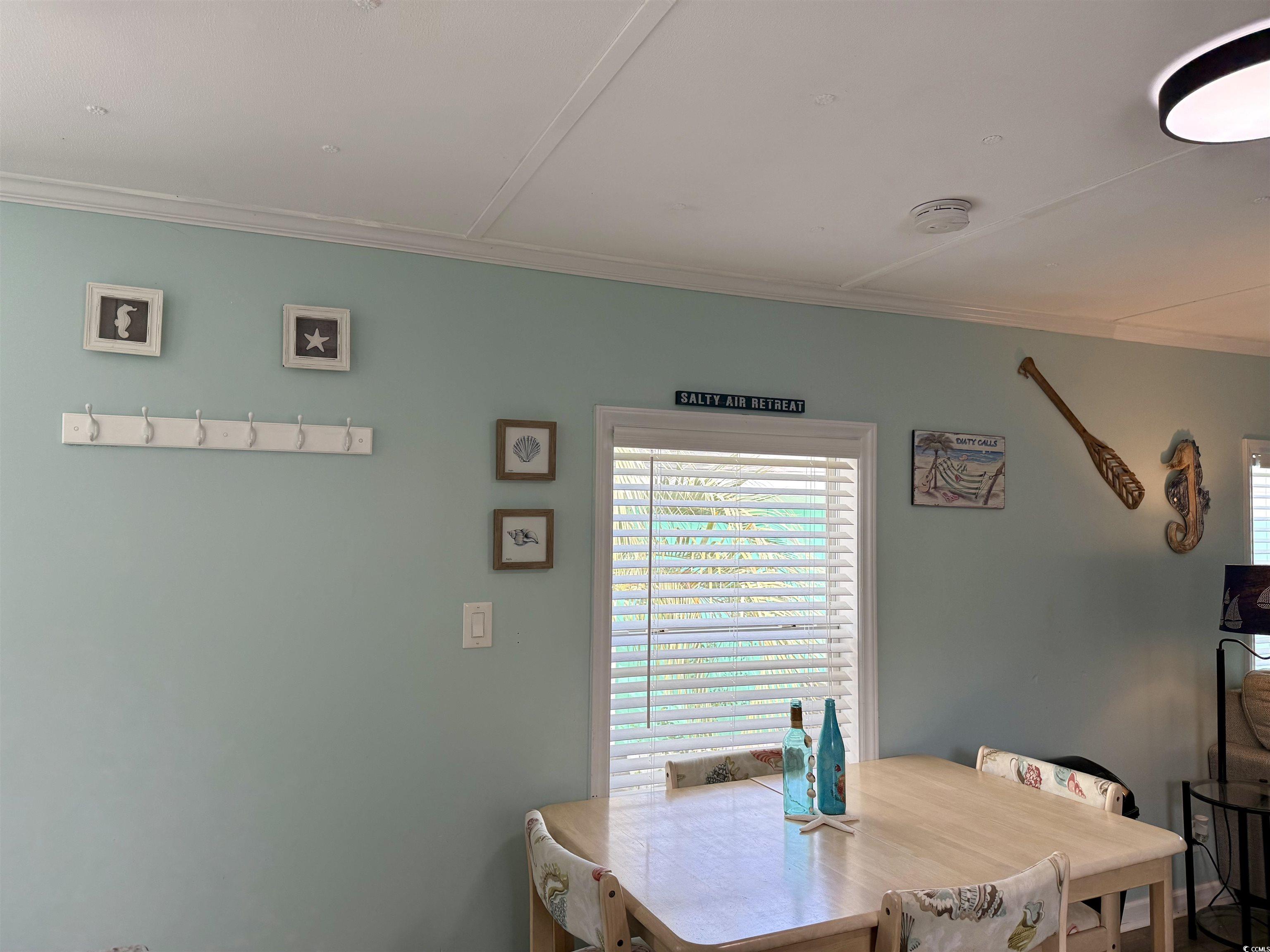 272 Flamingo Surfside Beach, SC 29575 - Photo 15 of 39 Dining room with ornamental molding