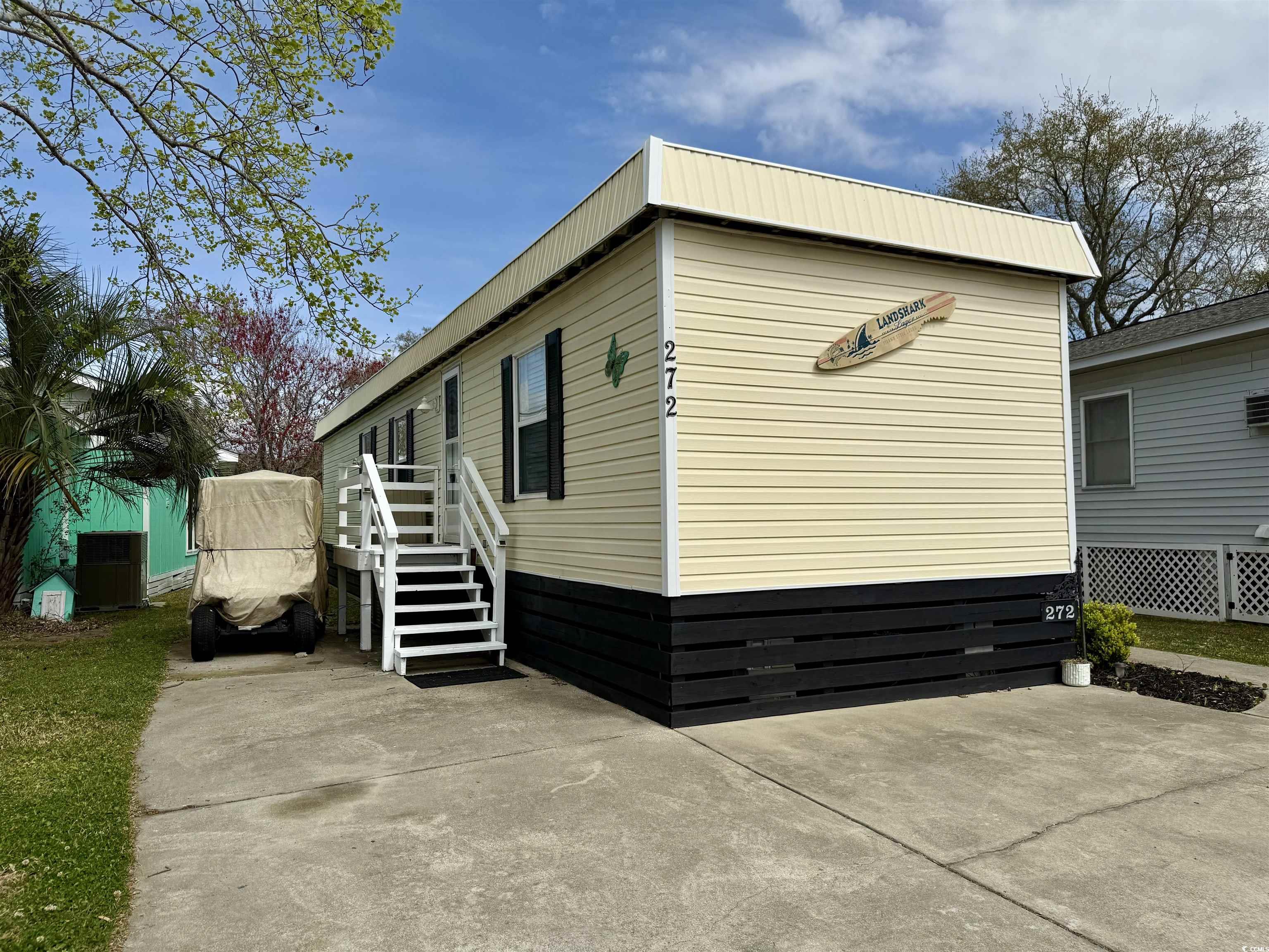 272 Flamingo Surfside Beach, SC 29575 - Photo 2 of 39 View of home's exterior featuring a patio