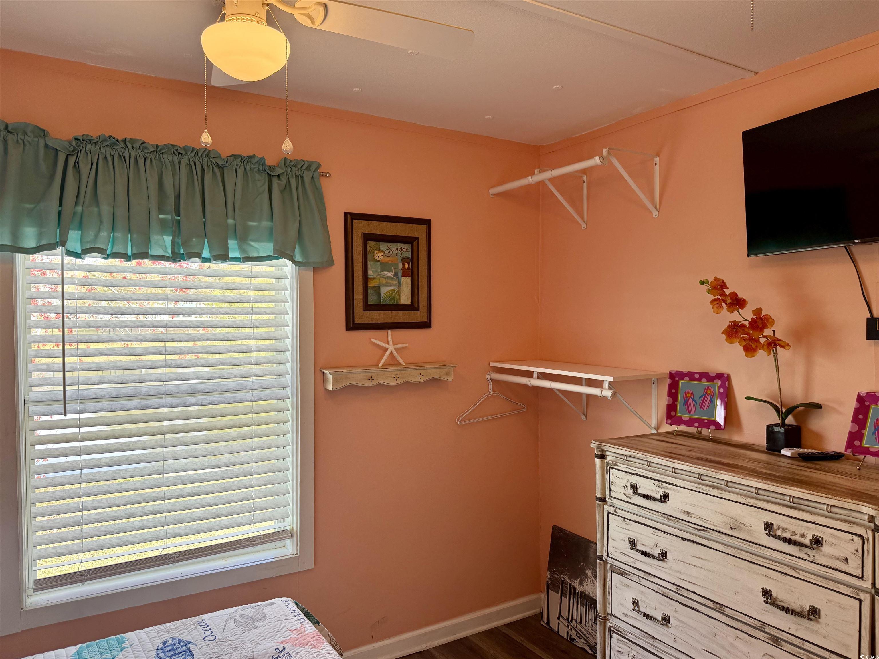 272 Flamingo Surfside Beach, SC 29575 - Photo 21 of 39 Spacious closet featuring dark wood-style floors
