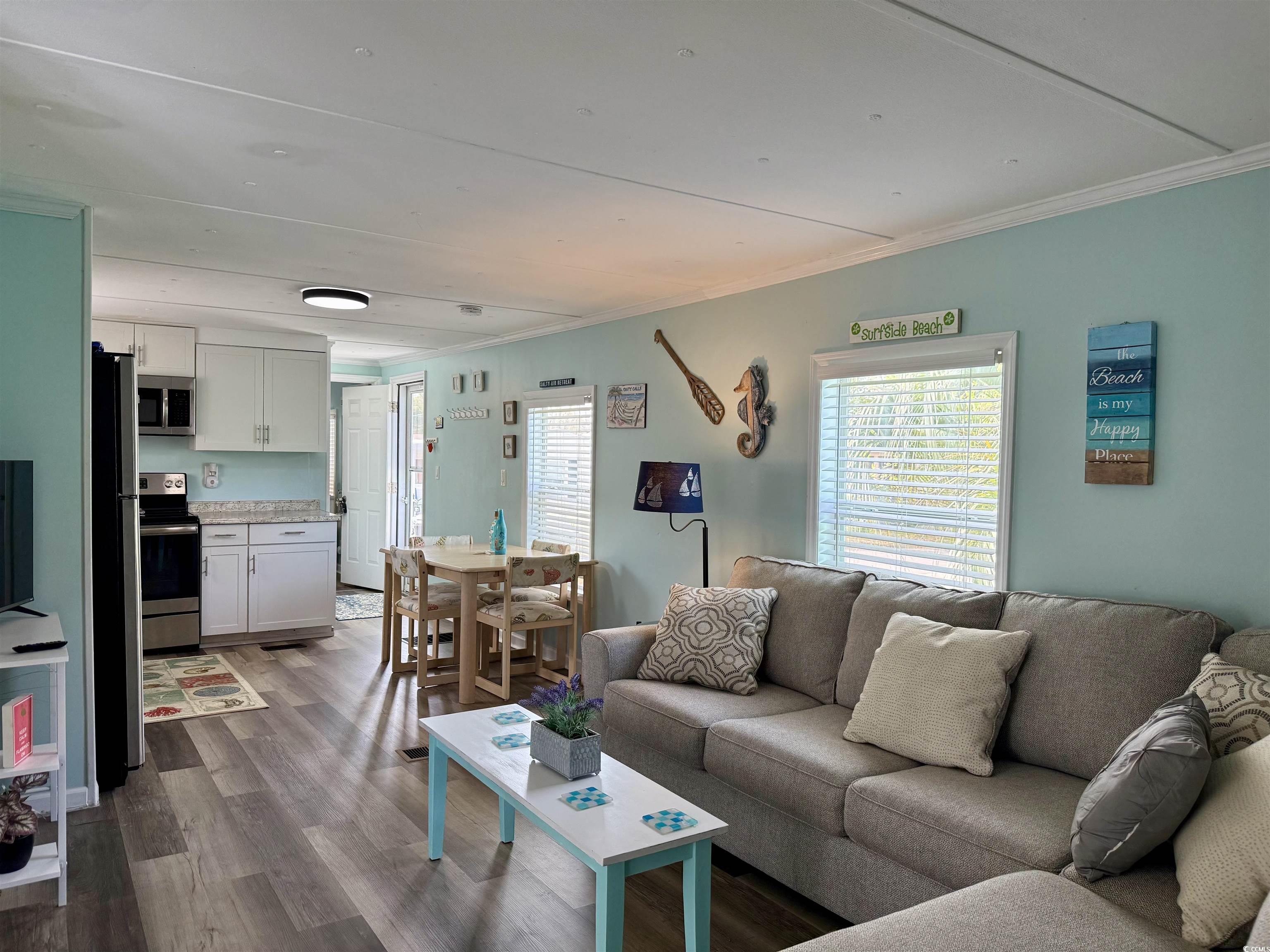 272 Flamingo Surfside Beach, SC 29575 - Photo 22 of 39 Living room with dark wood-style floors, a healthy