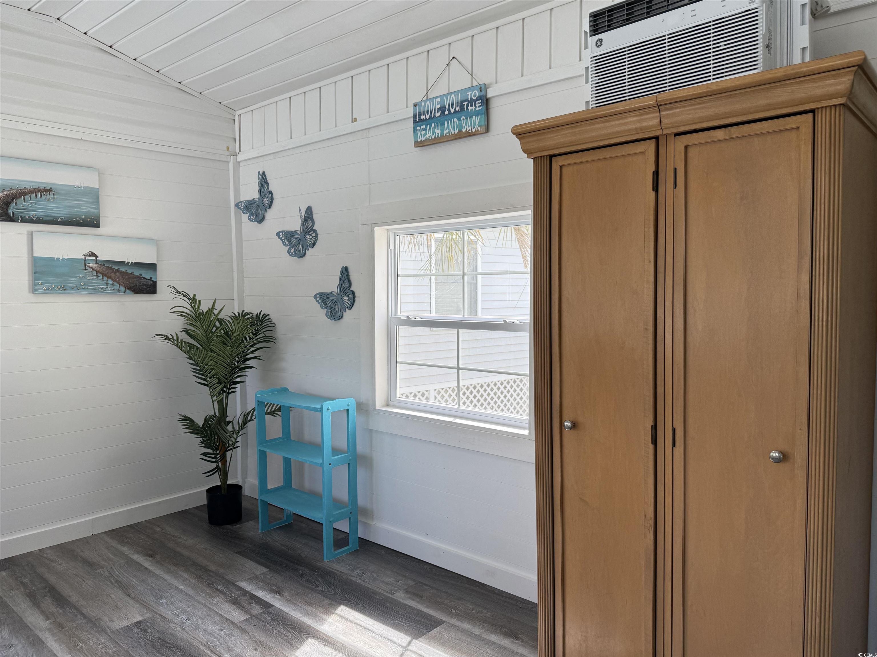 272 Flamingo Surfside Beach, SC 29575 - Photo 25 of 39 Doorway to outside featuring baseboards, wood fini
