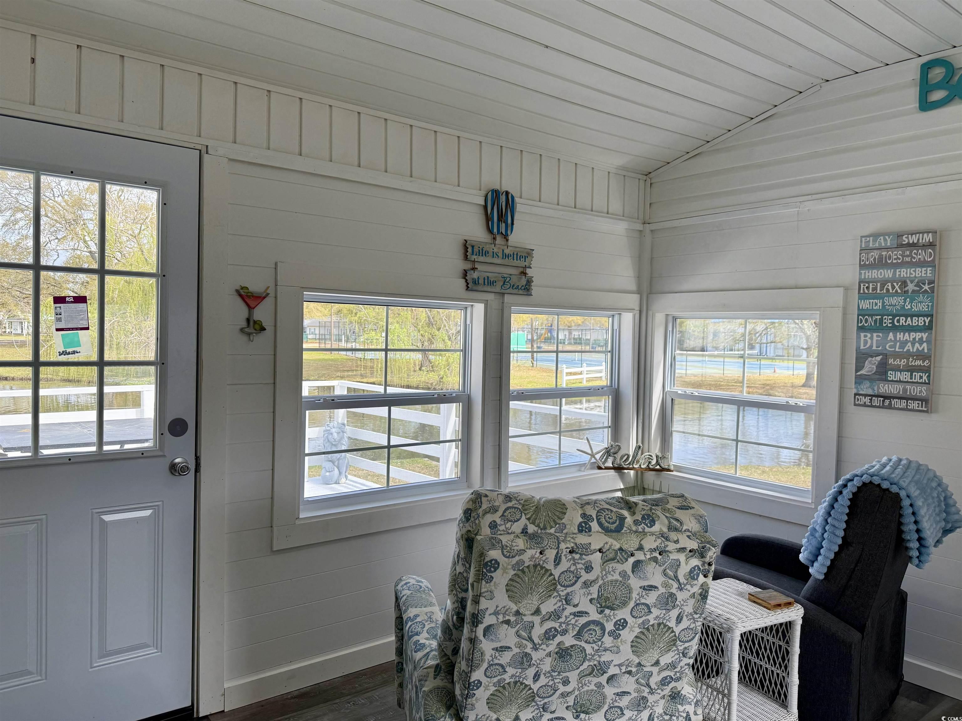 272 Flamingo Surfside Beach, SC 29575 - Photo 27 of 39 Dining room with wood ceiling, baseboards, and lof