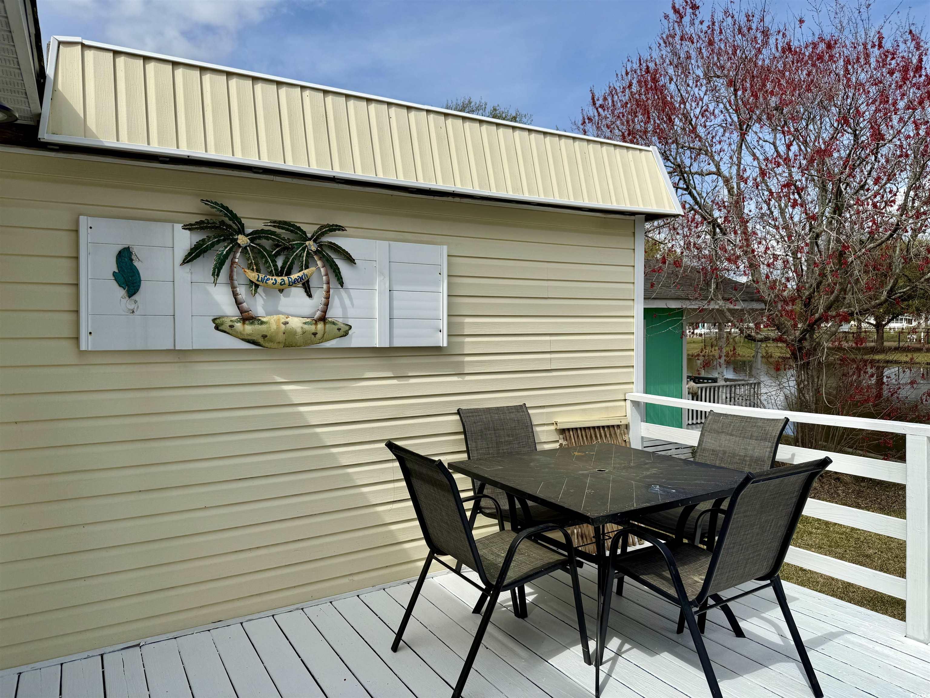 272 Flamingo Surfside Beach, SC 29575 - Photo 29 of 39 Deck with outdoor dining space