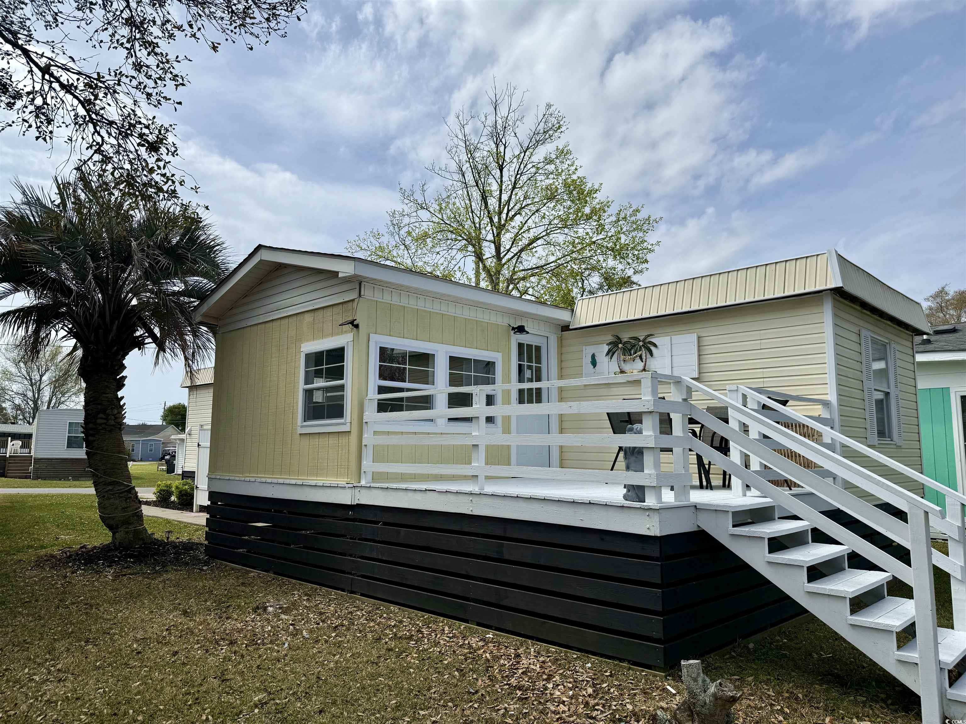 272 Flamingo Surfside Beach, SC 29575 - Photo 30 of 39 Rear view of house featuring a deck