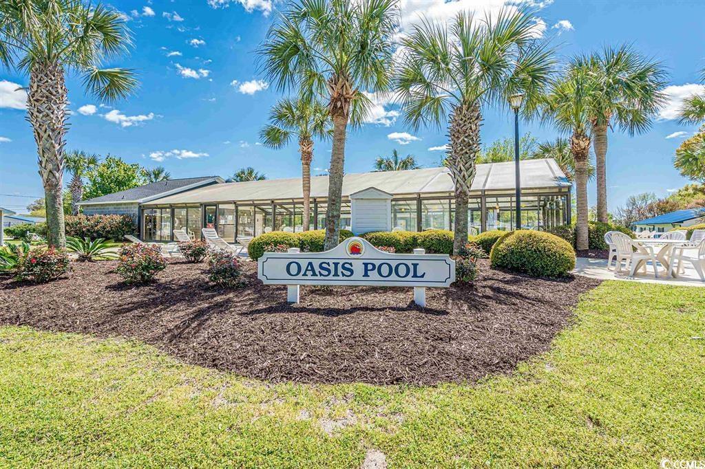 272 Flamingo Surfside Beach, SC 29575 - Photo 39 of 39 Community / neighborhood sign with a lawn