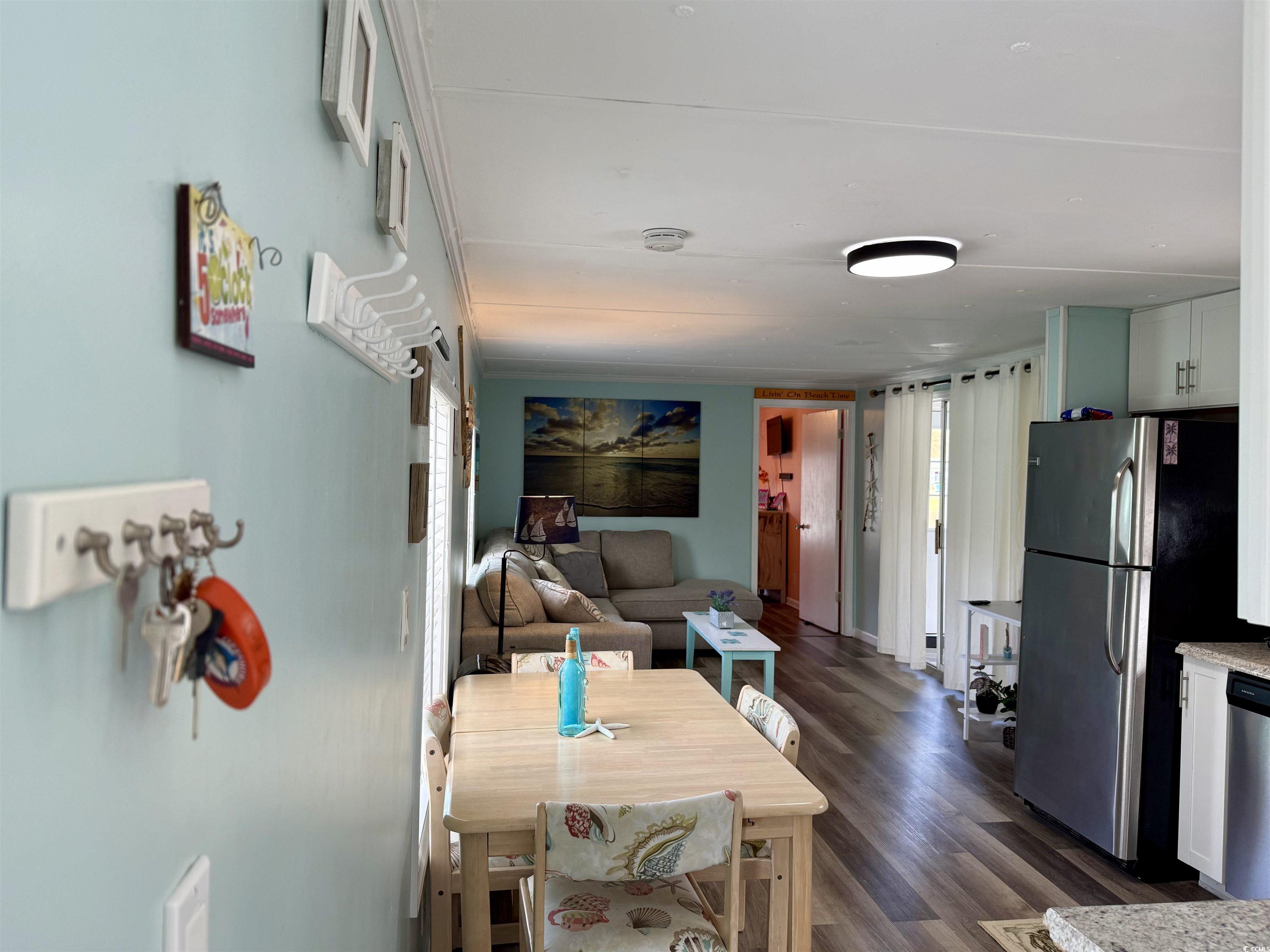 272 Flamingo Surfside Beach, SC 29575 - Photo 4 of 39 Dining room featuring dark wood-style floors