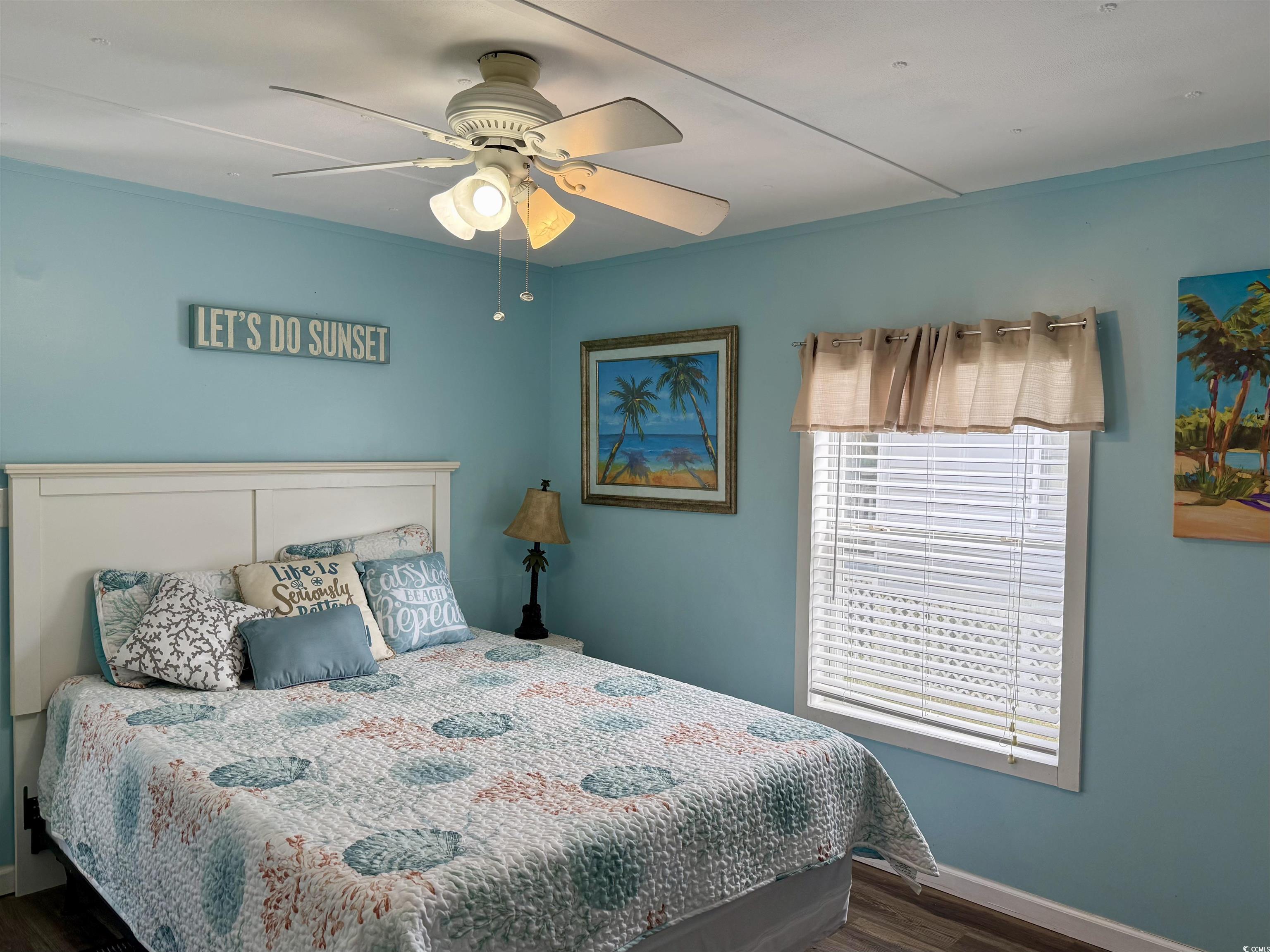 272 Flamingo Surfside Beach, SC 29575 - Photo 8 of 39 Bedroom with baseboards, wood finished floors, and