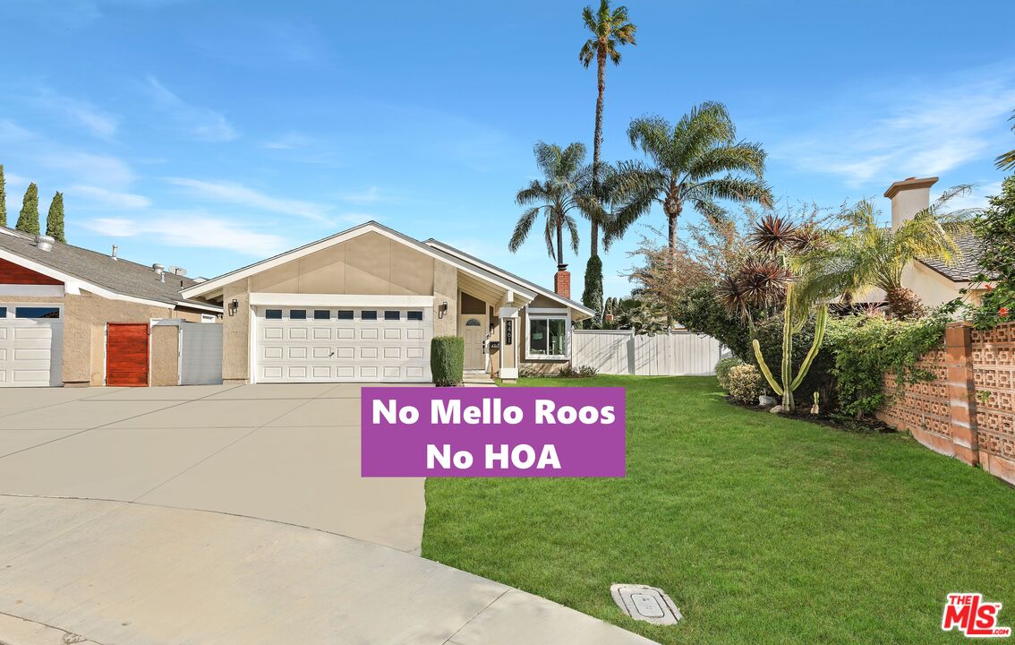 4461 Ranchgrove Drive Irvine, CA 92604 - Photo 1 of 2 a sign on the side of a road