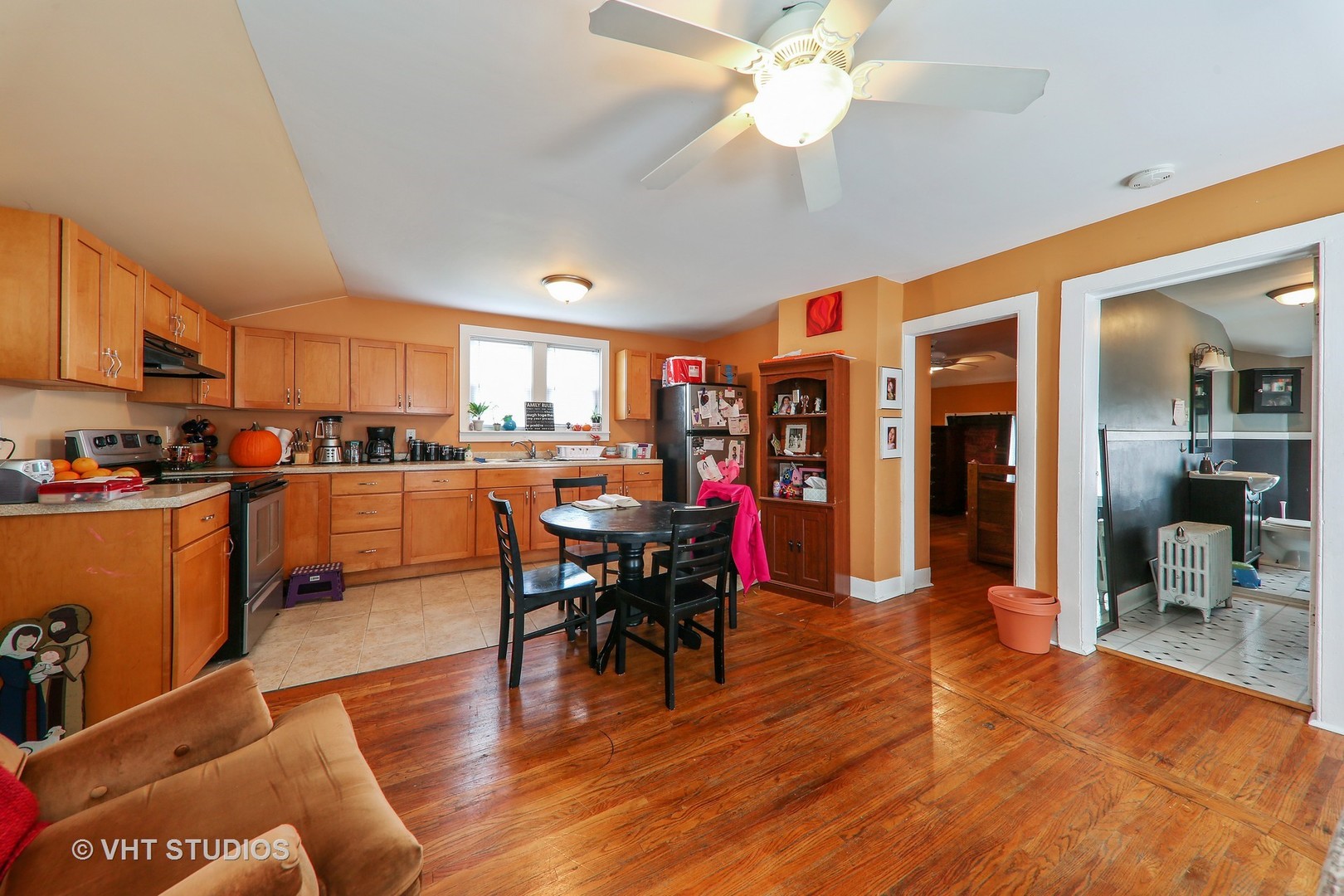 1141 South State Street Lockport, IL 60441 - Photo 11 of 15 a view of a dining room with furniture window and wooden floor