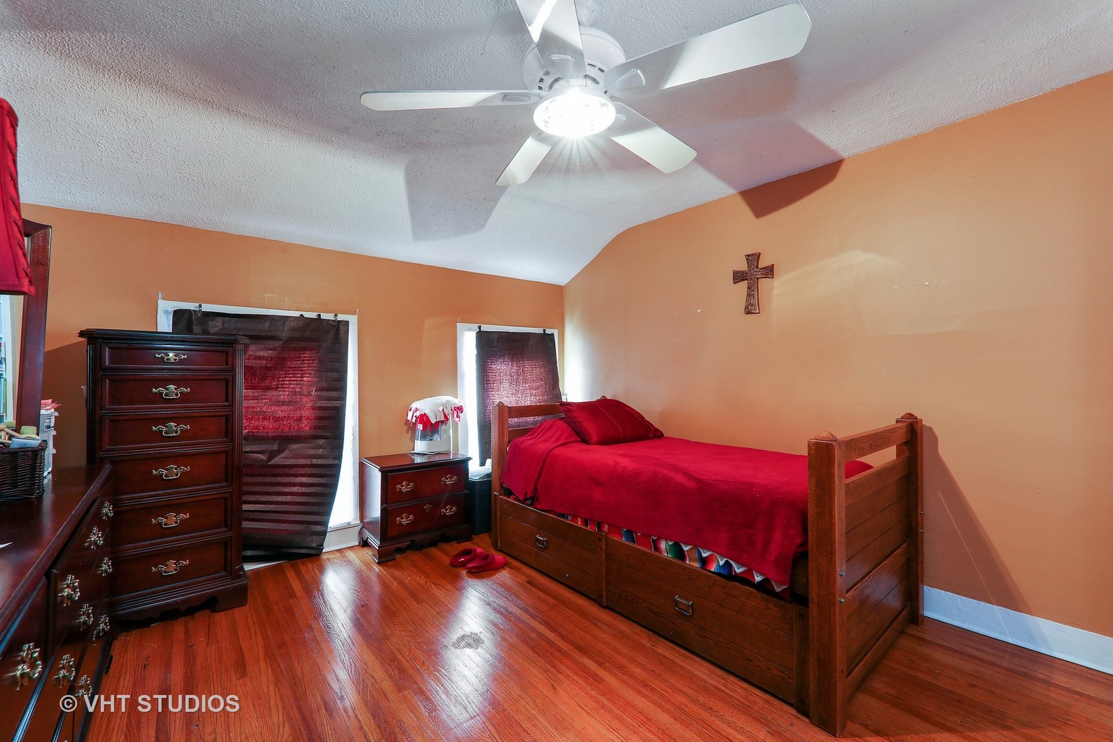 1141 South State Street Lockport, IL 60441 - Photo 12 of 15 a bedroom with a bed and wooden floor