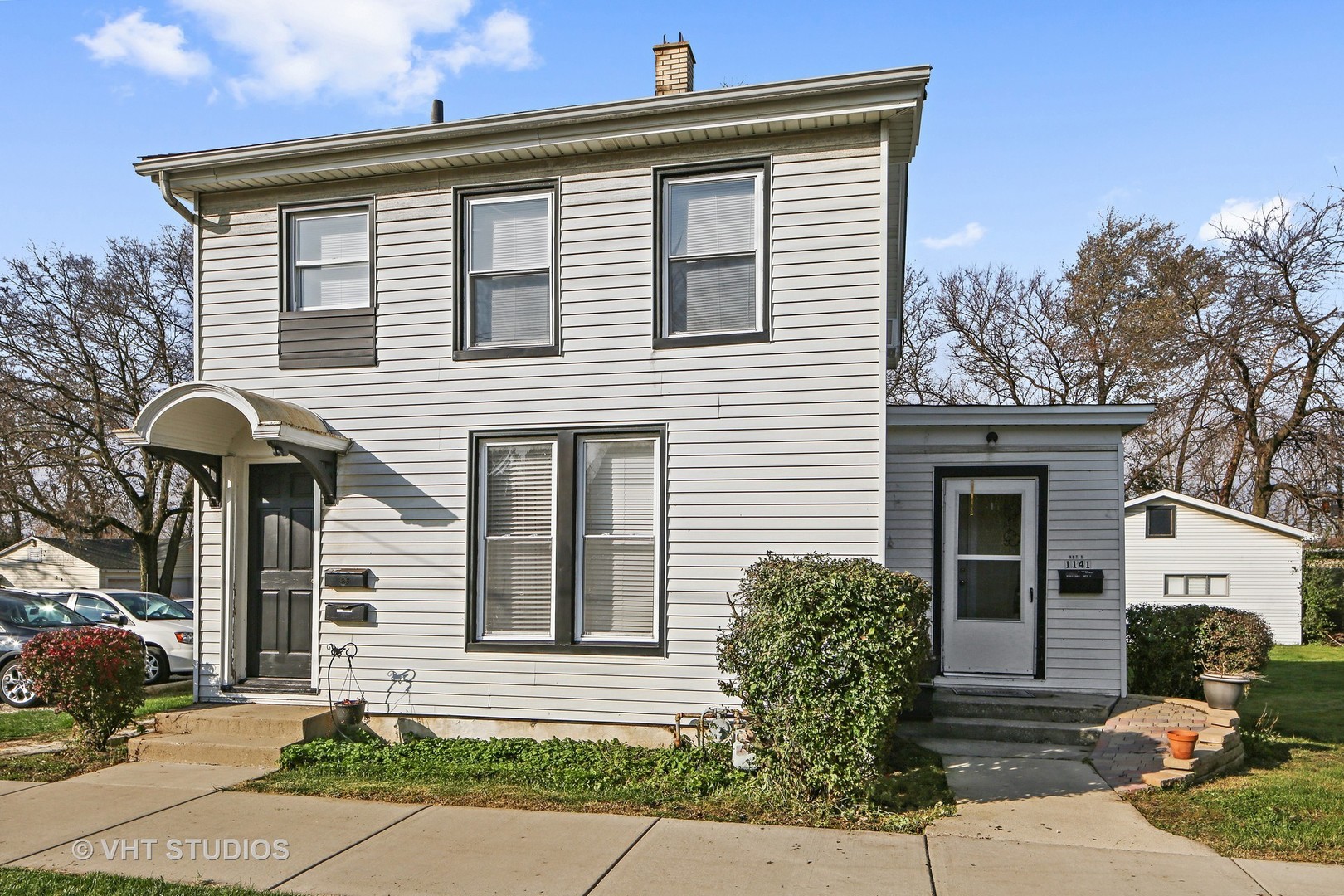 1141 South State Street Lockport, IL 60441 - Photo 15 of 15 a front view of a house with garden