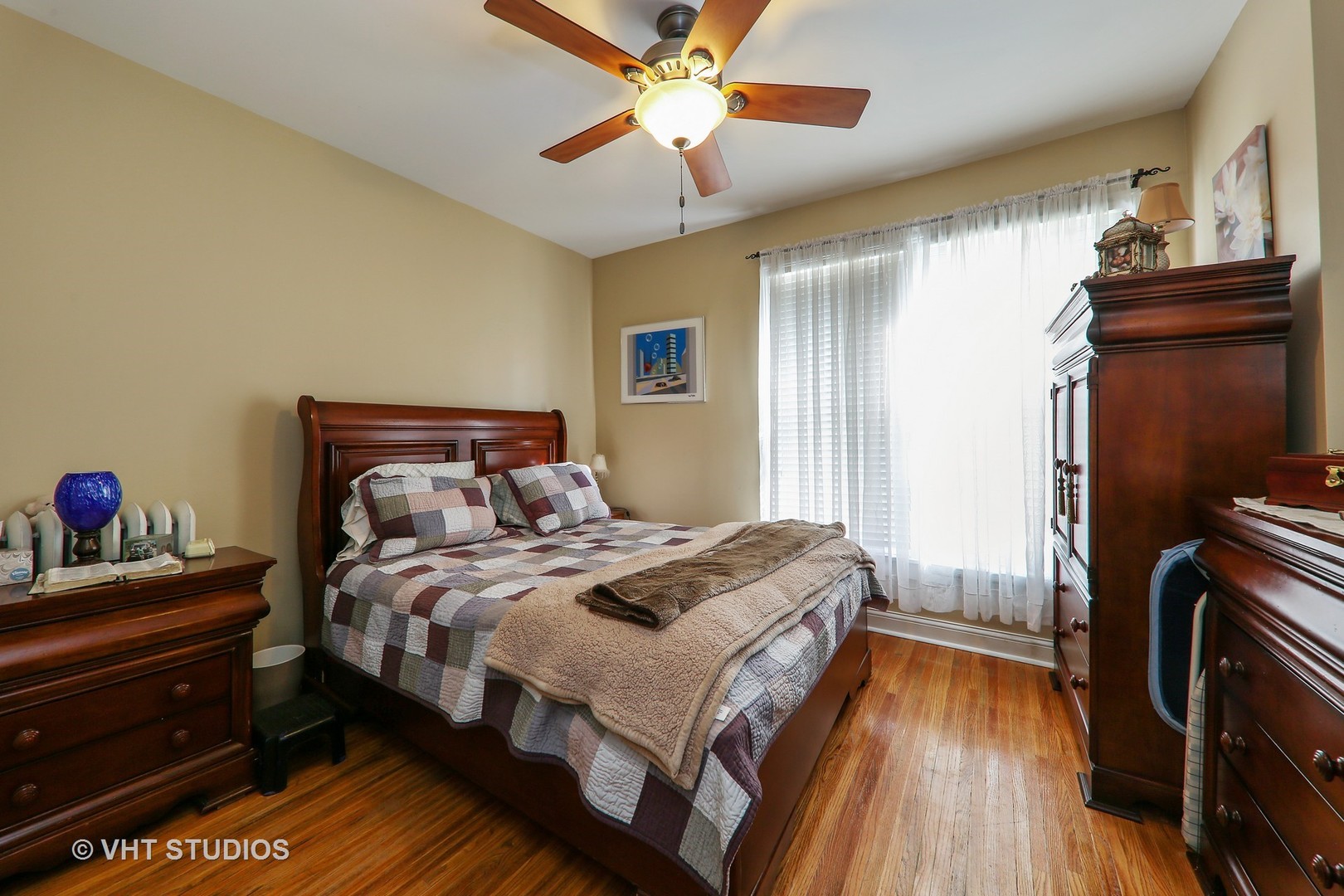 1141 South State Street Lockport, IL 60441 - Photo 6 of 15 a bedroom with a bed and wooden floor